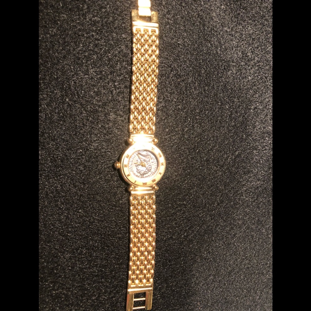 Carol Lee gold plated quartz crystal watch Ceasar